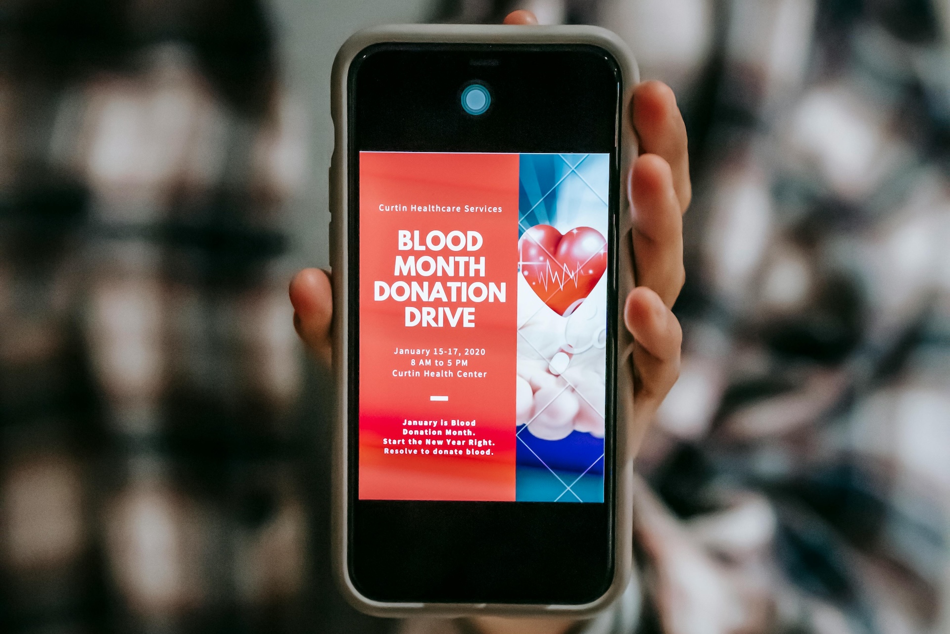 A smartphone with a screen showing nonprofit fundraising software